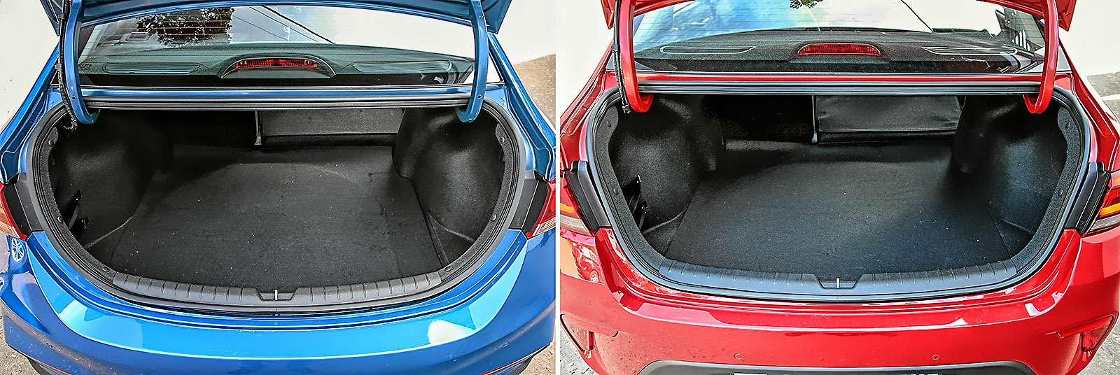 Несмотря на одинаковые объемы багажников (480 литров), грузить крупногабаритные вещи проще в Kia - за счет более широкого проема. Разница составляет приличные 12 см и видна невооруженным глазом.