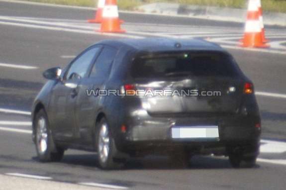 New Toyota Corolla hatchack test prototype side-rear view